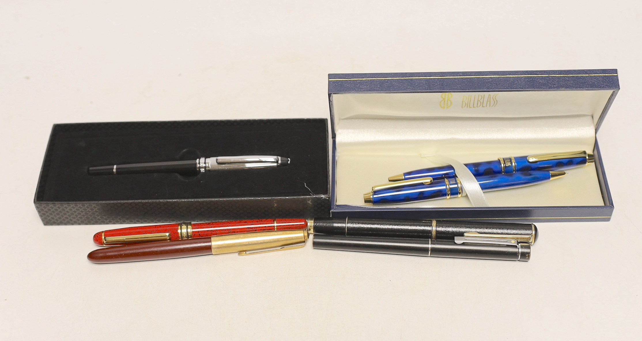 A boxed Montblanc Meisterstuck fountain pen and other pens